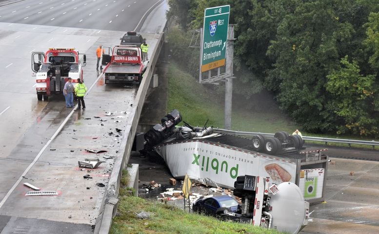 I-285 crash: Trucks plunge off interstate onto Ga. 400