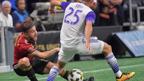 September 16, 2017 Atlanta - Atlanta United forward Hector Villalba (15) works with the ball against Orlando City SC defender Donny Toia (25) in the first half of an MLS soccer match at the Mercedes-Benz Stadium on Saturday, September 16, 2017. HYOSUB SHIN / HSHIN@AJC.COM