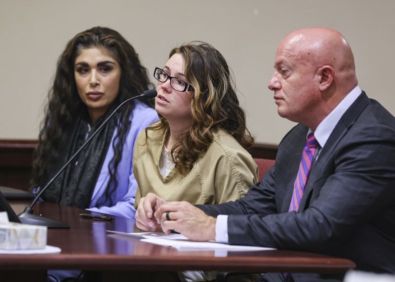 Hannah Gutierrez-Reed, the weapons supervisor on the set of the Western film “Rust," center, speaks to Judge T. Glenn Ellington during her plea hearing at the First Judicial District Courthouse in Santa Fe, N.M., Monday, Oct. 7, 2024. (Gabriela Campos/Santa Fe New Mexican via AP, Pool)