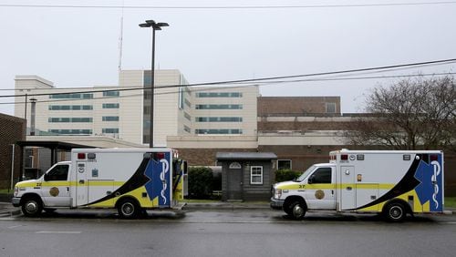 Two ambulances from Chatham EMS sit outside a temproary ambulance entrance at St. Joseph's Hospital on Friday March 10, 2023.