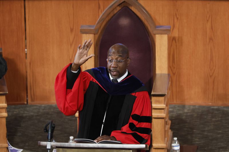 U.S. Sen. Raphael Warnock used a part of his Sunday sermon at Ebenezer Baptist Church to call for prayers for the U.S. Navy veteran suspected of attempting to set Martin Luther King Jr.’s birth home on fire. (Miguel Martinez /miguel.martinezjimenez@ajc.com)