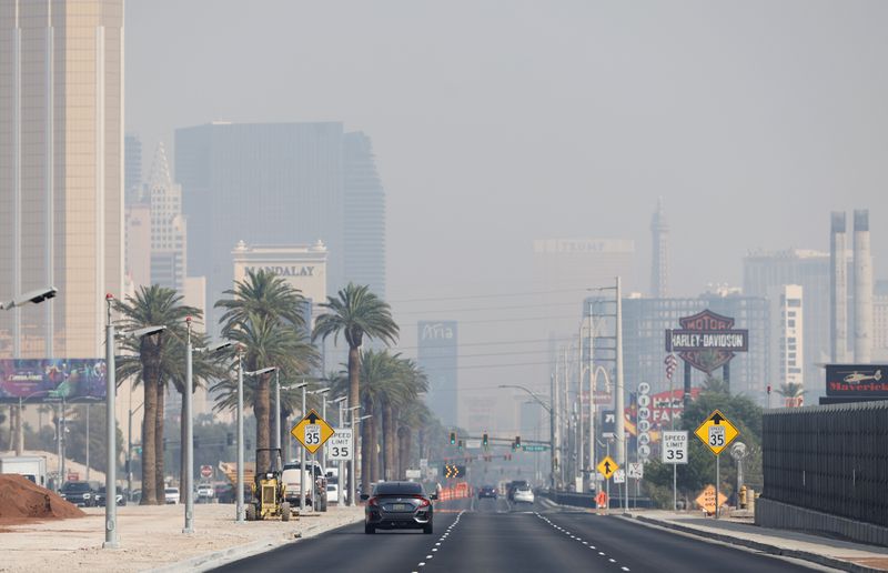 Smoke from California wildfires obscures the view of casinos northbound on the Las Vegas Strip in Las Vegas, Nev., Wednesday, Sept. 11, 2024. (Steve Marcus/Las Vegas Sun via AP)