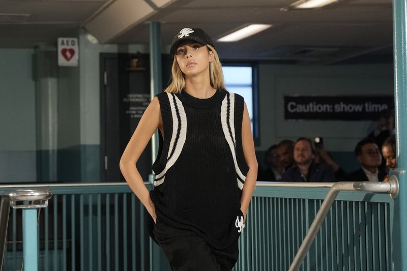 A model walks the runway during the Tommy Hilfiger Spring/Summer 2025 fashion show onboard a Staten Island Ferry as part of New York Fashion Week on Sunday, Sept. 8, 2024, in New York. (Photo by Charles Sykes/Invision/AP)