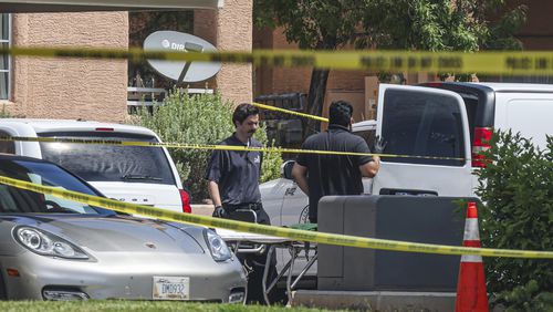 North Las Vegas Police investigate the scene of Monday night's shooting at an apartment complex in North Las Vegas, Tuesday, June 25, 2024. Authorities have arrested a man suspected in shootings at the apartments outside of Las Vegas that left five people dead and a 13-year-old girl critically wounded. (Rachel Aston/Las Vegas Review-Journal via AP)