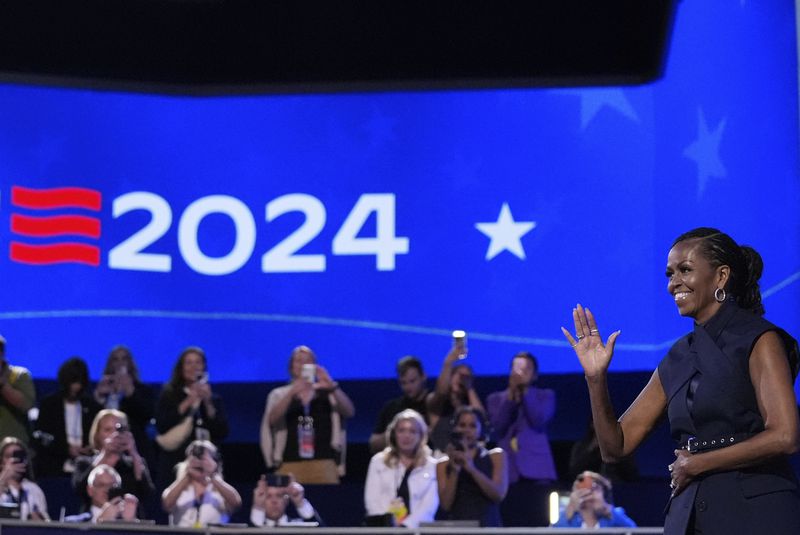 Former first lady Michelle Obama speaks during the Democratic National Convention Tuesday, Aug. 20, 2024, in Chicago. (AP Photo/Brynn Anderson)