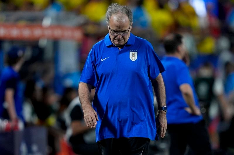 Uruguay's coach Marcelo Bielsa walks the sideline during a Copa America semifinal soccer match against Colombia in Charlotte, N.C., Wednesday, July 10, 2024. (AP Photo/Julia Nikhinson)