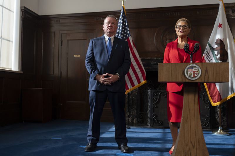 Los Angeles Mayor Karen Bass, right, introduces newly appointed police chief Jim McDonnell during a news conference in Los Angeles, Friday, Oct. 4, 2024. (AP Photo/Jae C. Hong)