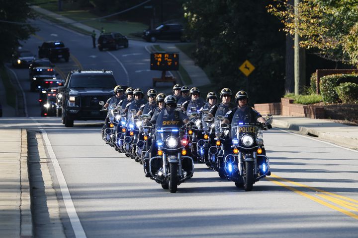 A motorcade leads the caravan, escorting the family of Deputy Jonathan Koleski to the NorthStar church for his funeral service on Wednesday, September 14, 2022. Wednesday, September 14, 2022. Miguel Martinez / miguel.martinezjimenez@ajc.com