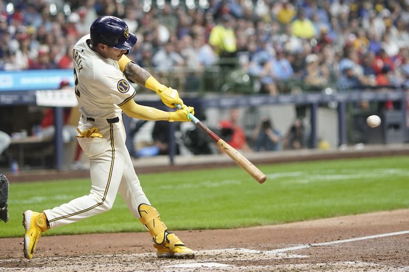 Milwaukee Brewers' Joey Ortiz hits an RBI triple during the sixth inning of a baseball game against the Philadelphia Phillies Monday, Sept. 16, 2024, in Milwaukee. (AP Photo/Morry Gash)