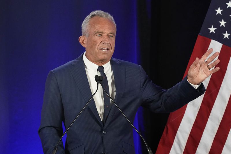 Independent presidential candidate Robert F. Kennedy Jr. announces he is suspending his presidential campaign at a news conference Friday, Aug 23, 2024, in Phoenix. (AP Photo/Darryl Webb)