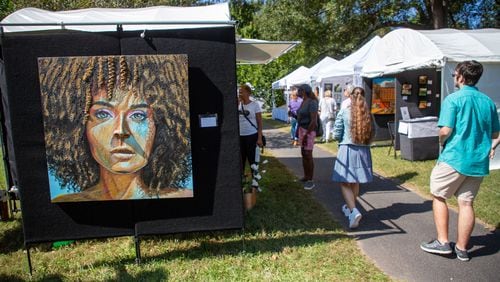 People walk by the artists' booths during the Festival on Ponce on Sunday, October 10, 2021. Presented by the Atlanta Foundation for Public Spaces, the fest in Olmsted Linear Park returns Oct. 5-6, 2024. (Photo: Steve Schaefer for The Atlanta Journal-Constitution)