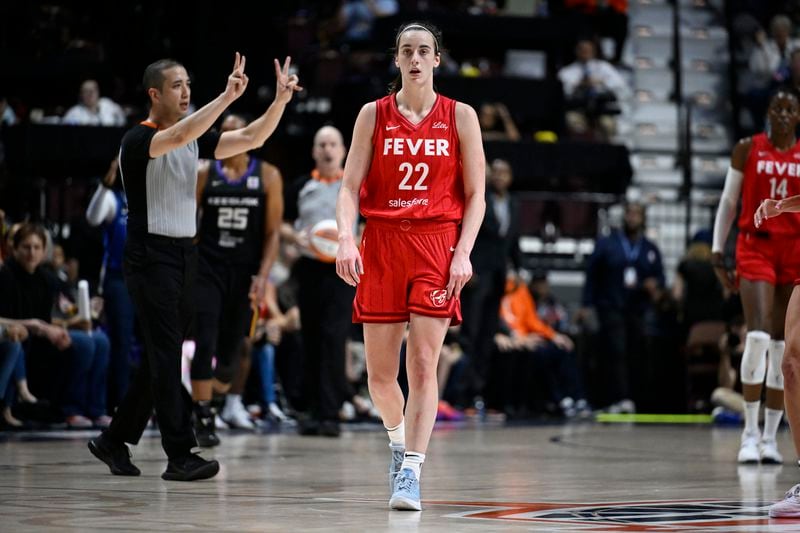 Indiana Fever guard Caitlin Clark (22) receives a delay of game warning during the second half of Game 2 of a first-round WNBA basketball playoff series agains the Connecticut Sun, Wednesday, Sept. 25, 2024, in Uncasville, Conn. (AP Photo/Jessica Hill)