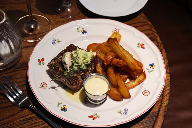 La Vie en Rose brings steak haché — ground rib-eye shaped into a square patty and cooked — with pomme frites and aioli. Courtesy of Little Sparrow
