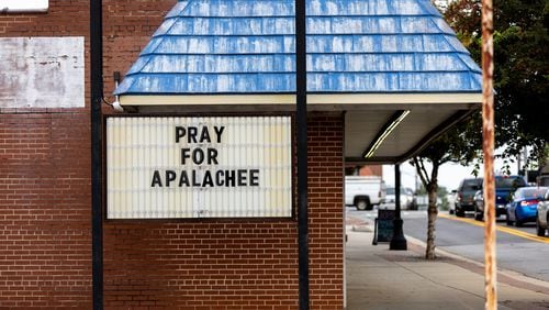 A “Pray for Apalachee” sign is seen in downtown Winder on Friday, Sept. 6, 2024. A 14-year-old Apalachee student is accused of shooting and killing two fellow students and two teachers and injuring nine others at Apalachee High School on Wednesday. (Arvin Temkar / AJC)