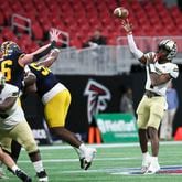 Swainsboro's Demello Jones attempts a pass against Prince Avenue Christian in the Class A Division I GHSA State Championship game at Mercedes-Benz Stadium, Monday, December. 11, 2023. (Jason Getz / Jason.Getz@ajc.com)