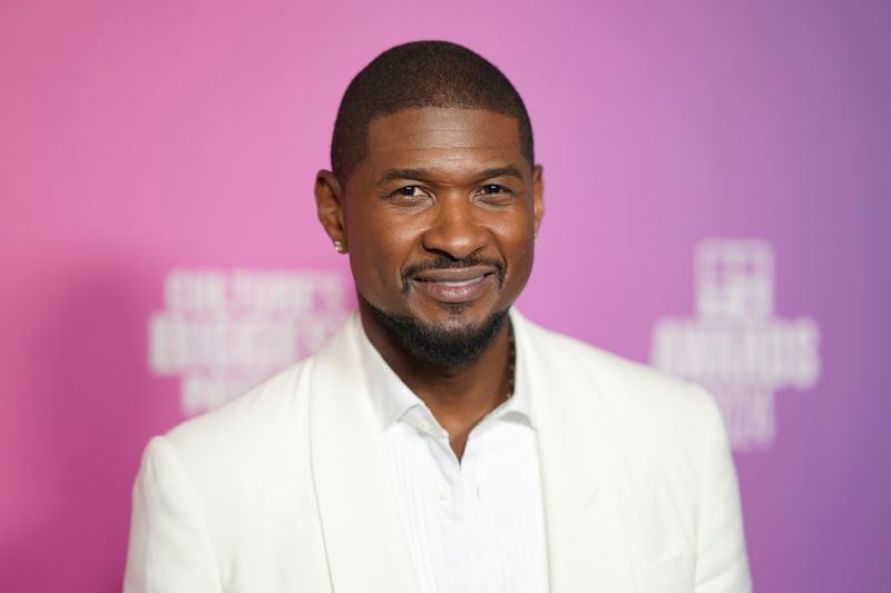 Usher, recipient of the Lifetime Achievement award, poses in the press room during the BET Awards on Sunday, June 30, 2024, at the Peacock Theater in Los Angeles. (Photo by Jordan Strauss/Invision/AP)