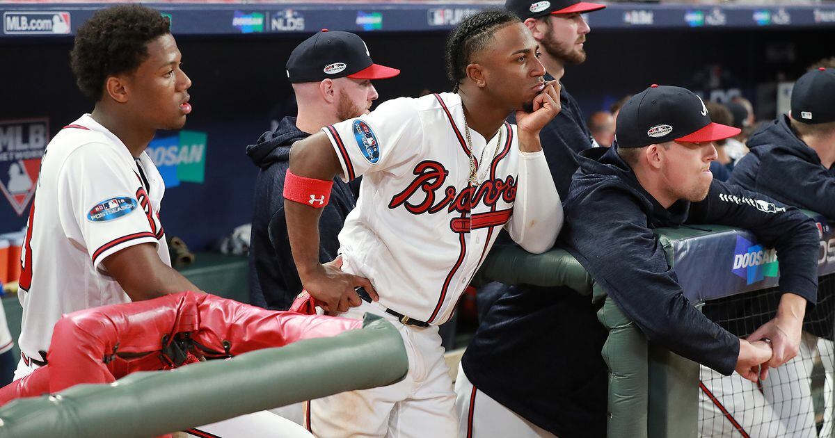 File:Ozzie Albies walks away from celebrating Nationals from