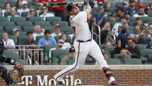 The Braves' Austin Riley watches the ball after hitting a solo home run during the first inning against the Miami Marlins at Truist Park on Thursday, August 1, 2024, in Atlanta. 
(Miguel Martinez/ AJC)