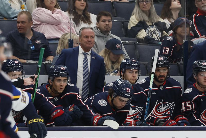 Columbus Blue Jackets head coach Dean Evason watches his team play against the St. Louis Blues during the third period of a preseason NHL preseason hockey game Wednesday, Sept. 25, 2024, in Columbus, Ohio. (AP Photo/Jay LaPrete