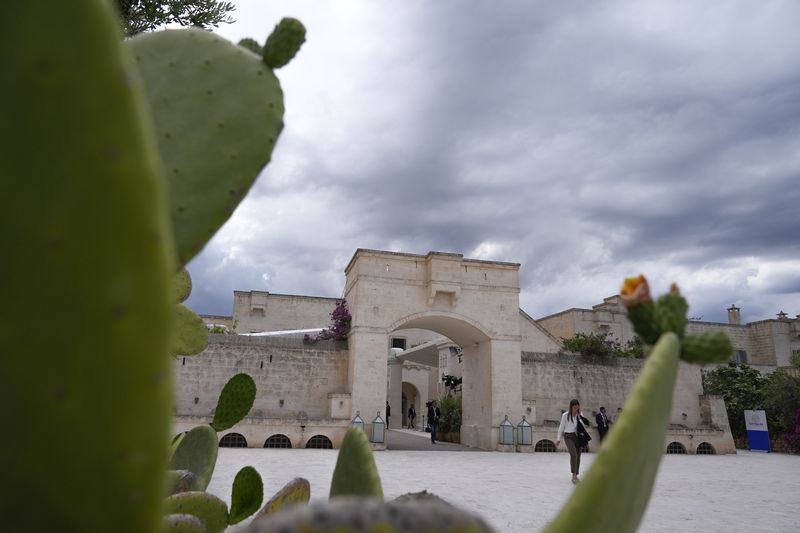 Prickly pear trees frame the entrance of the site hosting the G7 summit, Thursday, June 13, 2024, in Borgo Egnazia, Italy. (AP Photo/Alex Brandon)