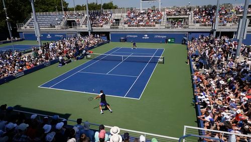 Jakub Mensik, of the Czech Republic, returns a shot to Felix Auger-Aliassime, of Canada, during the first round of the U.S. Open tennis championships, Tuesday, Aug. 27, 2024, in New York. (AP Photo/Pamela Smith)