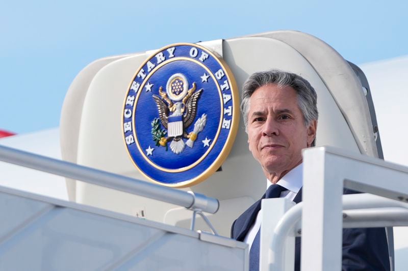 U.S. Secretary of State, Antony Blinken waves as he arrives at Chopin Airport in Warsaw, Poland, Thursday, Sept. 12, 2024. (AP Photo/Mark Schiefelbein, Pool)