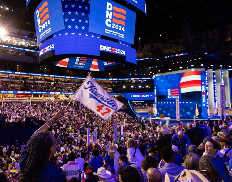 An attendee waves a flag in support of Vice President Kamala Harris at the Democratic National Convention in Chicago.