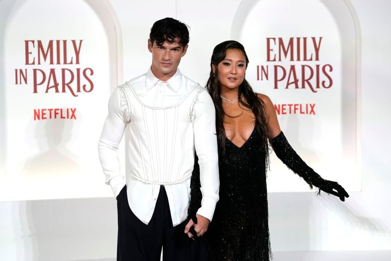 Actors Paul Forman, left, and Ashley Park arrive at the premiere of "Emily in Paris", in Rome, Tuesday, Sept. 10, 2024. (AP Photo/Andrew Medichini)