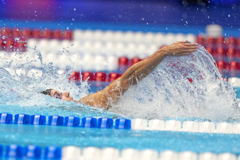 Regan Smith swims during a Women's 100 backstroke semifinals Monday, June 17, 2024, at the US Swimming Olympic Trials in Indianapolis. (AP Photo/Darron Cummings)