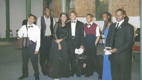 Participants in the Atlanta Symphony Orchestra's Talent Development Program gather backstage after a recital in 2002. Tara Byrdsong (third from left) said, “It was fun to be around students who were like-minded and who looked like me." (Courtesy of Tyra Byrdsong)