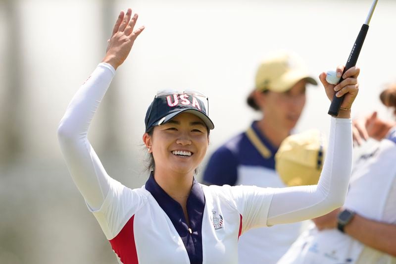 United States' Rose Zhang reacts after defeating Europe's Carlota Ciganda during a Solheim Cup golf tournament singles match at the Robert Trent Jones Golf Club, Sunday, Sept. 15, 2024, in Gainesville, Va. (AP Photo/Matt York)