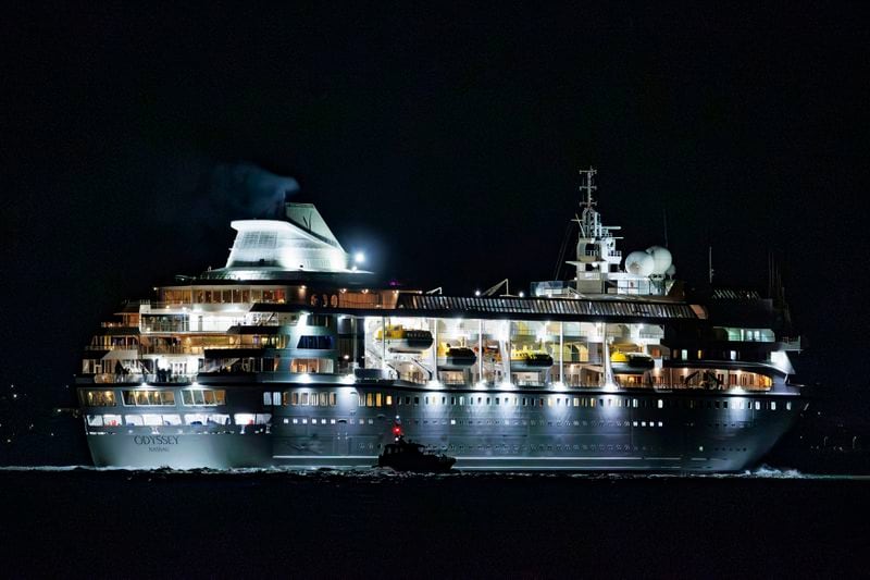 The Villa Vie Odyssey cruise ship leaves Belfast Harbour after the luxury cruise ship became marooned in Belfast, Northern Ireland, for four months due to unexpected repair works, Monday, Sept. 30, 2024. (Liam McBurney/PA via AP)