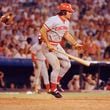 FILE - Pete Rose of the Cincinnati Reds in action at the bat against the Atlanta Braves in Atlanta, Aug. 2, 1978. At left is Atlanta catcher Joe Nolan. (AP Photo, File)