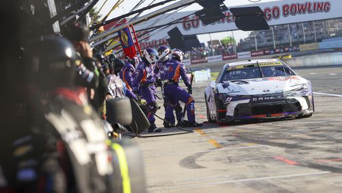 Chris Buescher (17) celebrates winning a NASCAR Cup Series auto race, Sunday, Sept. 15, 2024, in Watkins Glen, N.Y. (AP Photo/Lauren Petracca)