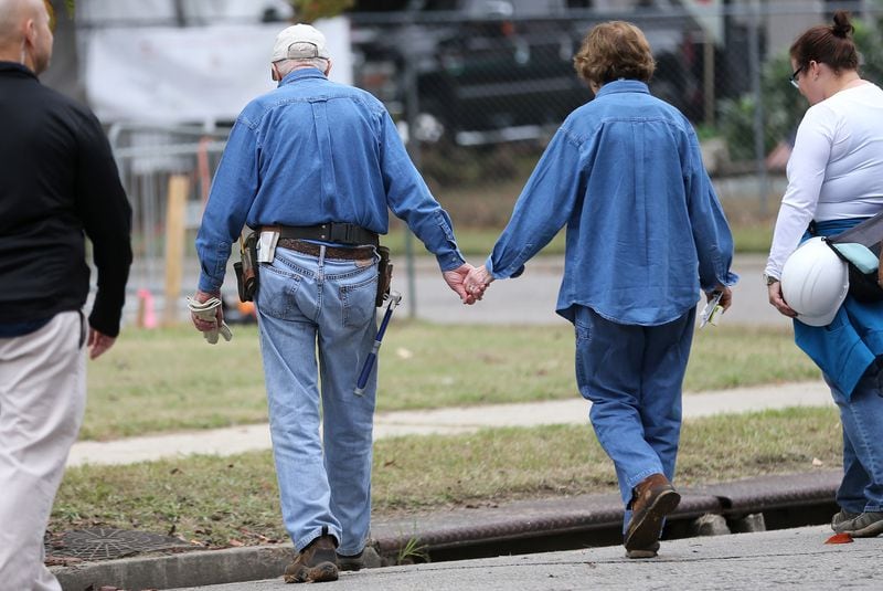 Jimmy and Rosalynn Carter walk hand-in-hand back to a Habitat for Humanity construction site after participating in a press conference on Monday, Nov, 2, 2015, in Memphis, Tennessee. (Ben Gray/The Atlanta Journal-Constitution/TNS)