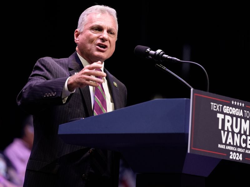 Rep. Buddy Carter, R-Ga., speaks before Republican presidential candidate former President Donald Trump arrives to deliver remarks on the tax code, and manufacturing at the Johnny Mercer Theatre Civic Center, Tuesday, Sept. 24, 2024, in Savannah, Ga. (AP Photo/Evan Vucci)