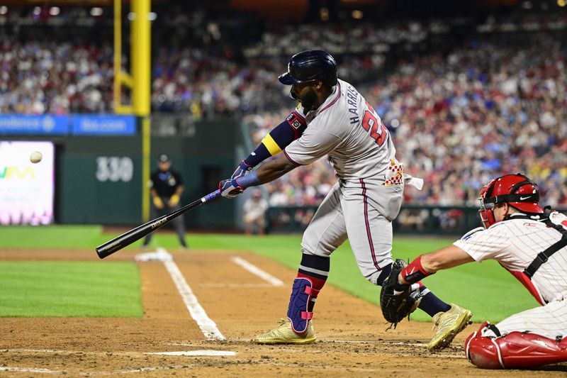 Atlanta Braves' Michael Harris II hits a solo home run off Philadelphia Phillies' Aaron Nola during the third inning of a baseball game, Sunday, Sept. 1, 2024, in Philadelphia. (AP Photo/Derik Hamilton)