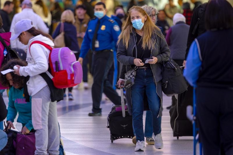 Passengers, with and without face mask, at Los Angeles International Airport on Wednesday, Jan. 10, 2024, in Los Angeles, California. (Irfan Khan/Los Angeles Times/TNS)