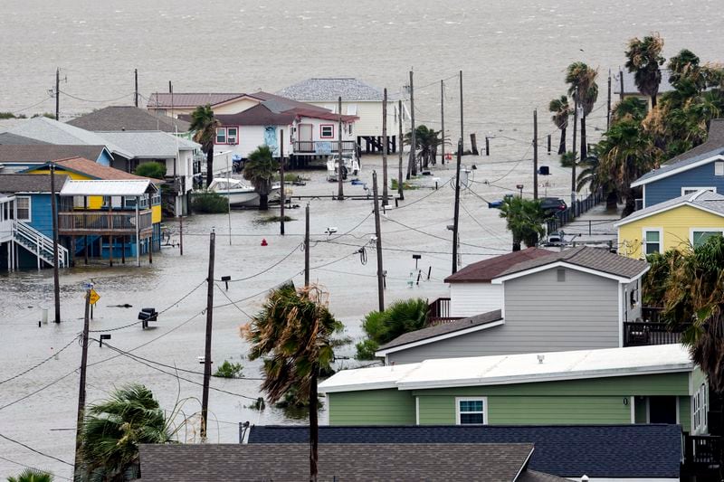 The storm surge from Tropical Storm Alberto, floods the streets in Surfside Beach, Texas, Wednesday, June 19, 2024. ( Jon Shapley/Houston Chronicle via AP)