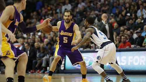 Jose Calderon (5) then of the Los Angeles Lakers was claimed off waivers by the Hawks Saturday. (Photo by Ronald Martinez/Getty Images)