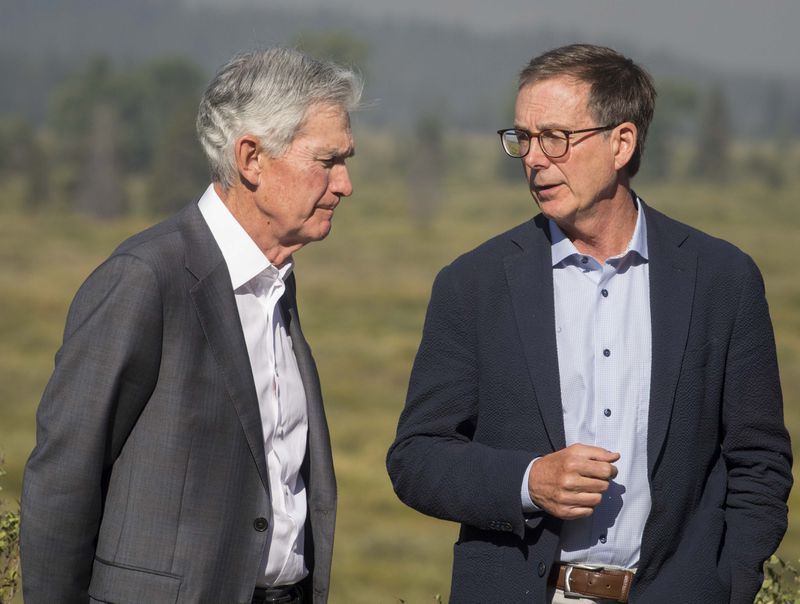 Federal Reserve Chairman Jerome Powell, left, speaks with Governor of the Bank of Canada Tiff Macklem outside of the Jackson Hole Economic Symposium at Jackson Lake Lodge in Grand Teton National Park near Moran, Wyo., on Aug. 23, 2024. (AP Photo/Amber Baesler)