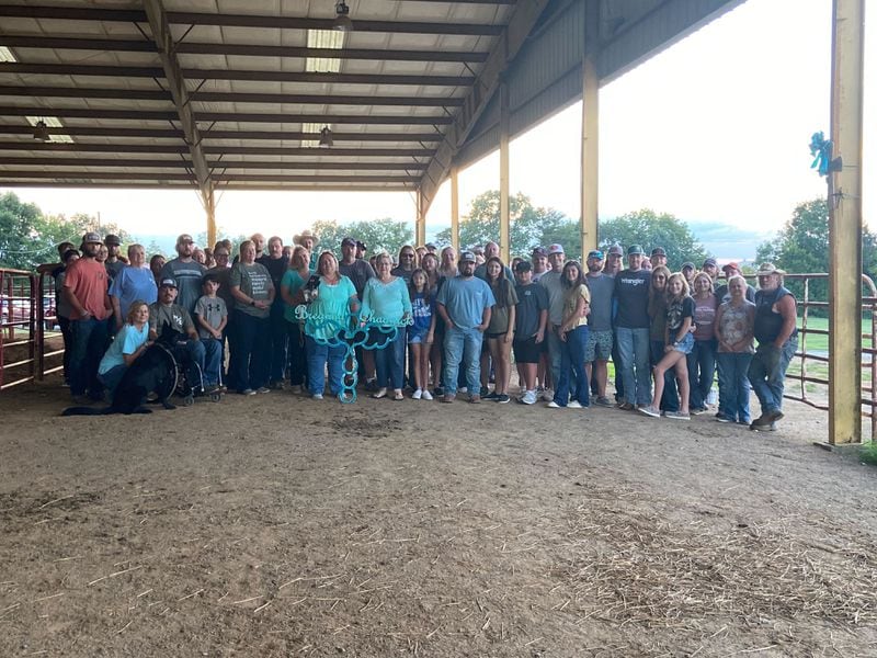 Friends and family celebrate Breanna Chadwick's legacy and help put up her memorial at the Murray County Saddle Club.