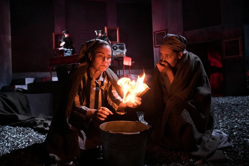 Mezzo-soprano Elise Quagliata (left) and Atlanta Opera Studio Artist Bryn Holdsworth perform in the Atlanta Opera production of Jake Heggie’s “Out of Darkness: Two Remain.” CONTRIBUTED BY JEFF ROFFMAN