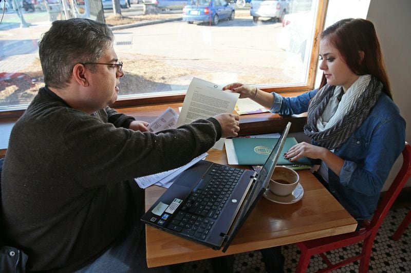 Jim Zaffiro, left, and his daughter Emily Zaffiro, 17, work on filling out a FAFSA form, which determines how much and what types of financial aid students are eligible for when starting college. MICHAEL SEARS/MILWAUKEE JOURNAL SENTINEL/TNS