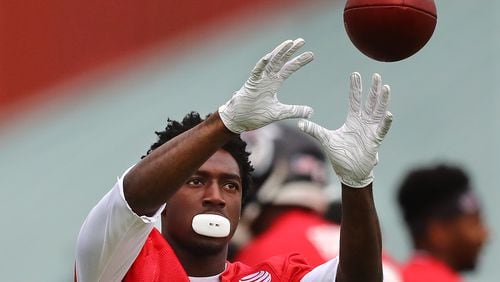 Falcons wide receiver Calvin Ridley makes a catch during the second practice at training camp on Tuesday, July 23, 2019, in Flowery Branch.