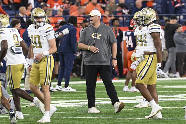 Georgia Tech head coach Brent Key instructs his players during the first half of an NCAA football game against Syracuse, Saturday, Sept. 7, 2024 in Syracuse, N.Y. (AP Photo/Hans Pennink)