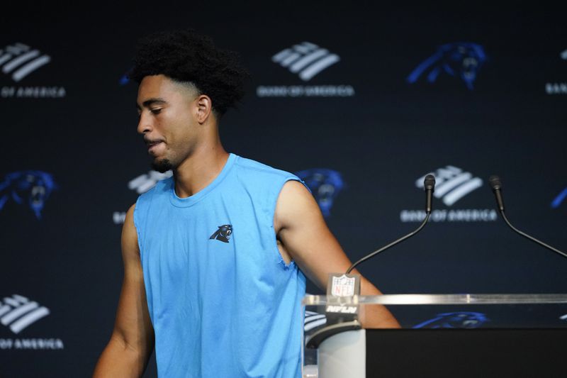 Carolina Panthers quarterback Bryce Young leaves a news conference after their loss to the Los Angeles Chargers in an NFL football game on Sunday, Sept. 15, 2024, in Charlotte, N.C. (AP Photo/Erik Verduzco)