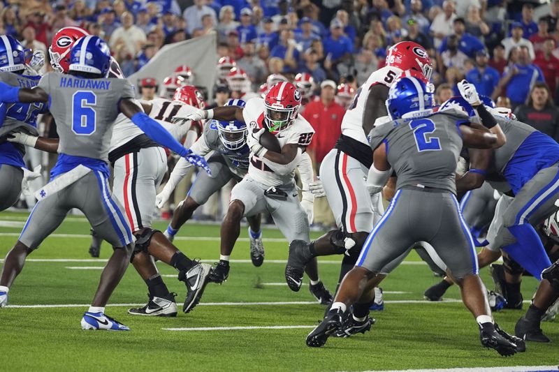 Georgia running back Branson Robinson (22) runs for a touchdown during the second half of an NCAA college football game against Kentucky, Saturday, Sept. 14, 2024, in Lexington, Ky. (AP Photo/Darron Cummings)