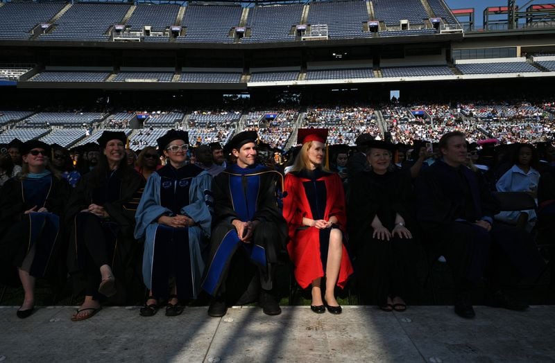 Georgia State University faculty members participate in a 2022 commencement ceremony. (Hyosub Shin / Hyosub.Shin@ajc.com)