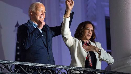 President Joe Biden raises the hand of Vice President Kamala Harris after viewing the Independence Day fireworks display over the National Mall from the balcony of the White House, Thursday, July 4, 2024, in Washington. She's already broken barriers, and now Harris could soon become the first Black woman to head a major party's presidential ticket after President Joe Biden's ended his reelection bid. The 59-year-old Harris was endorsed by Biden on Sunday, July 21, after he stepped aside amid widespread concerns about the viability of his candidacy. (AP Photo/Evan Vucci)